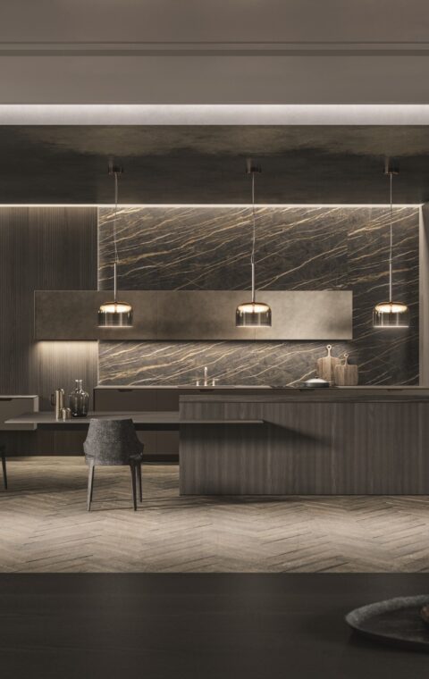 Cuisine sur mesure moderne avec trois suspensions éclairant le plan de travail